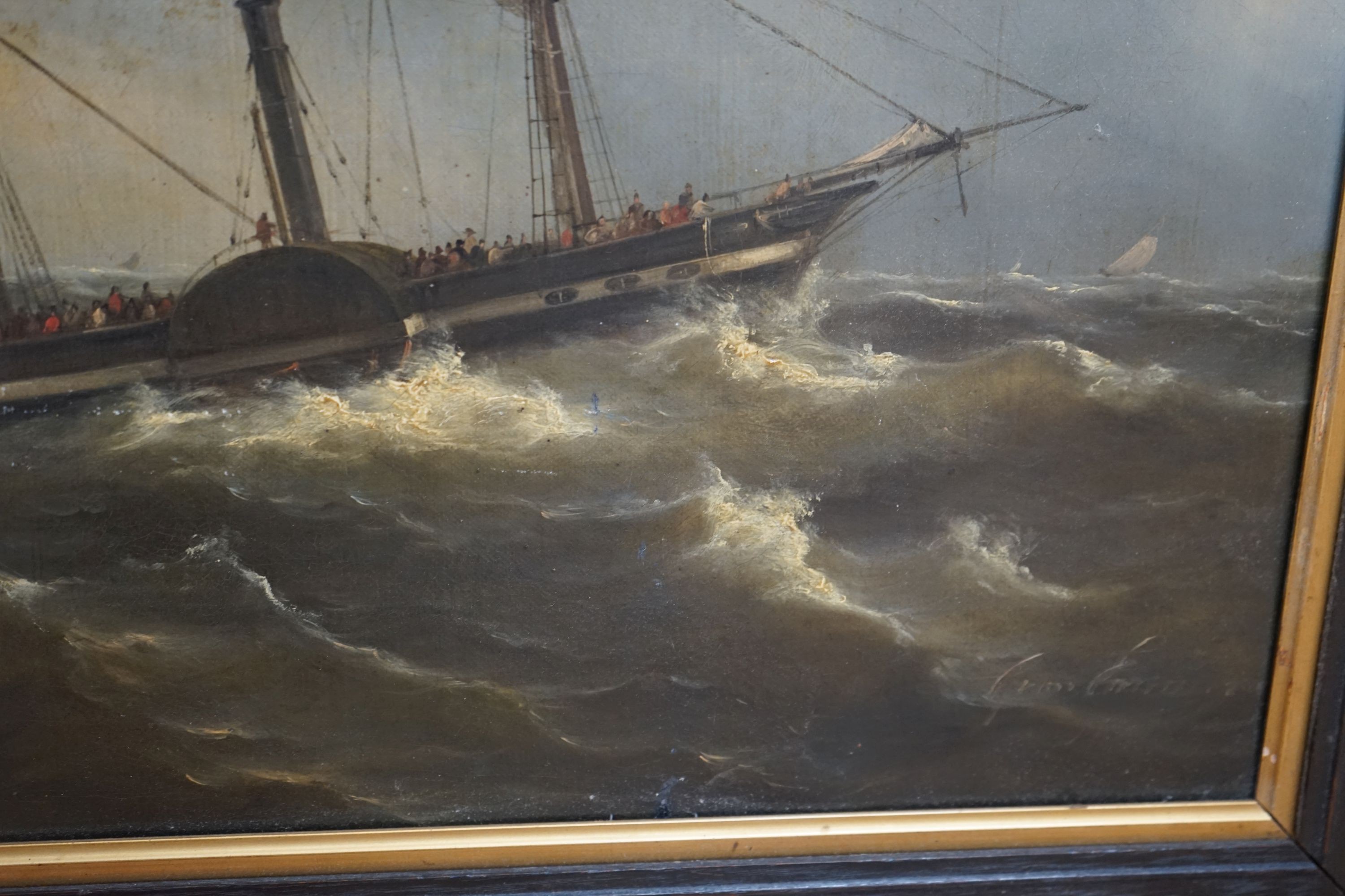 Marine School (19th century), oil on canvas, Dutch paddle steamer and sailing boat in rough seas off the shore, a lighthouse on the cliffs, indistinctly signed and dated, 54 x 70cm